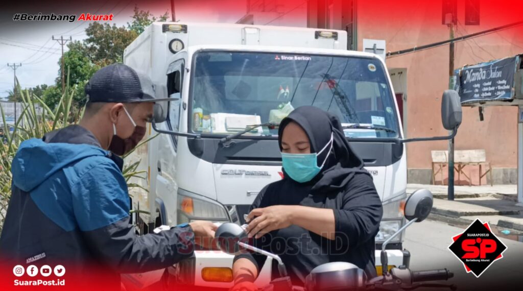 Dampak Vulkanik, Ajp-SMSI Pohuwato Bagi 2000 Masker untuk Masyarakat